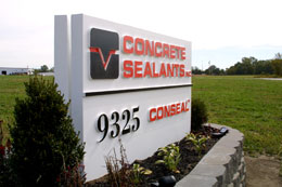 Double-sided precast concrete commercial sign