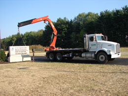 Installation of a precast concrete commercial sign